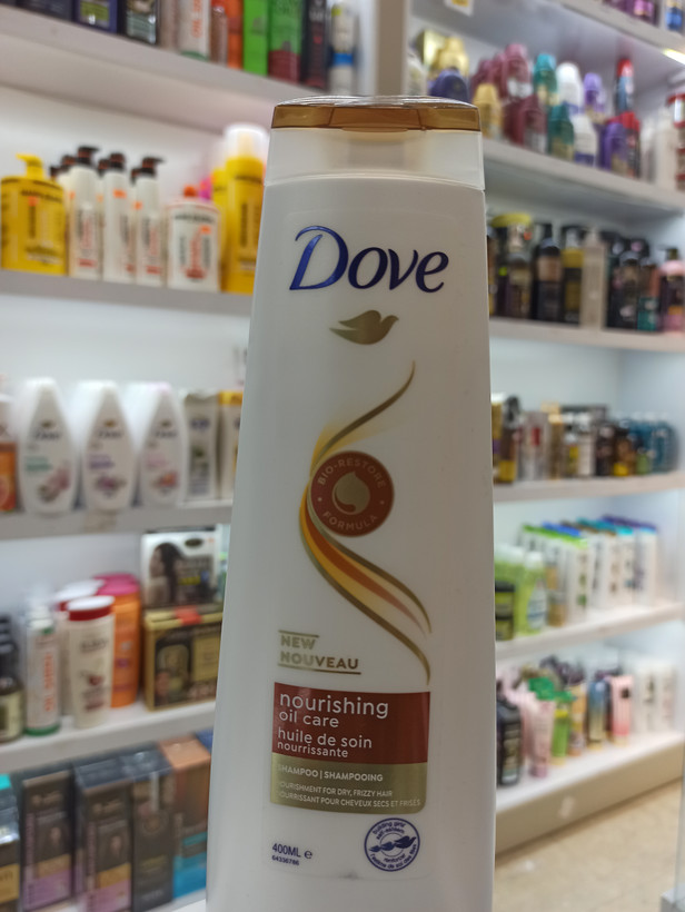 شامپو داو مدل Nourishing Oil Care مراقبت مغذی با روغن مناسب موهای خشک و وز حجم ۴۰۰ میل