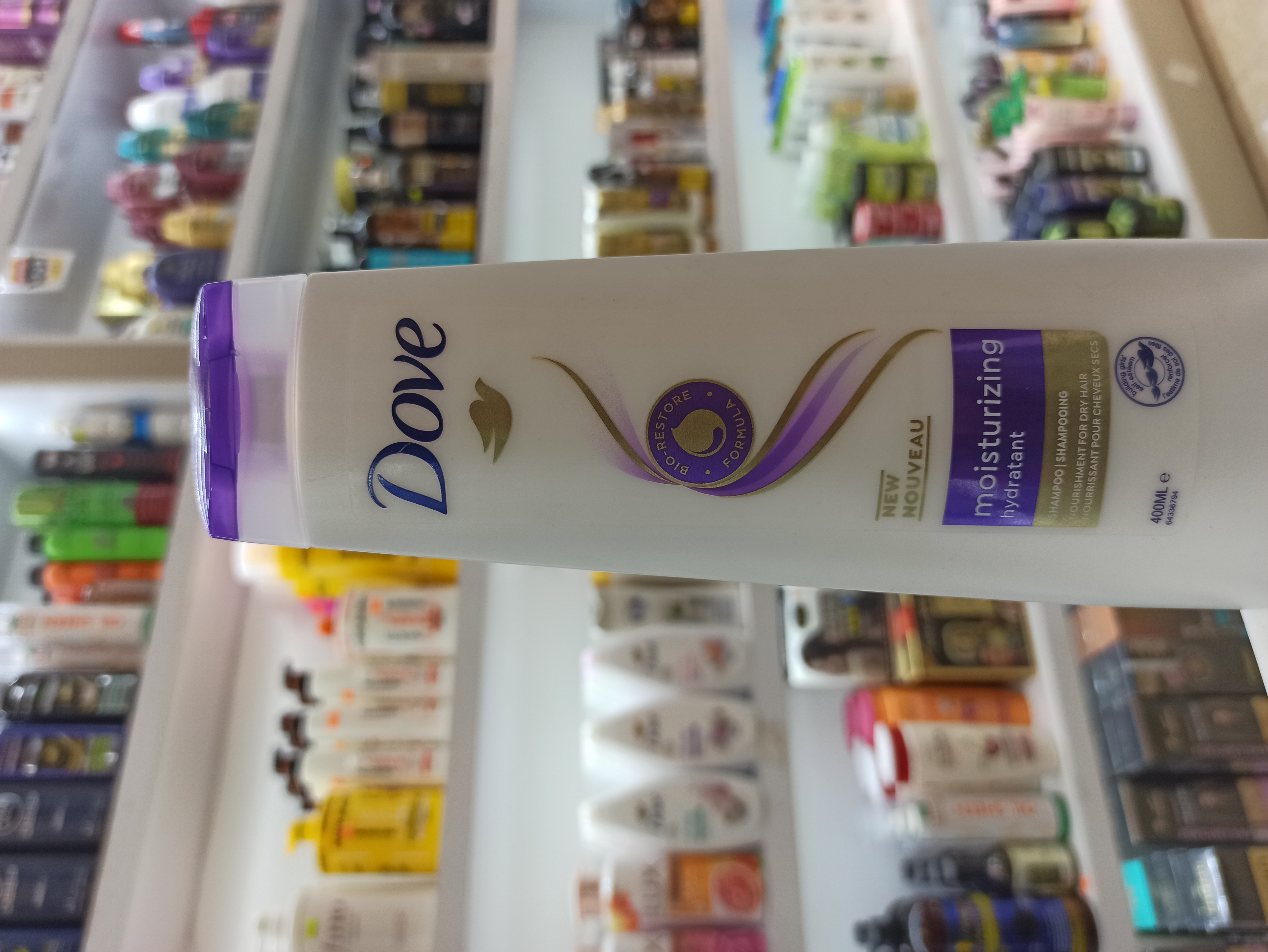 شامپو داو مدل Moisturizing Hydratant آبرسان و مرطوب ‌کننده مناسب موهای خشک و کم‌ آب حجم ۴۰۰ میل