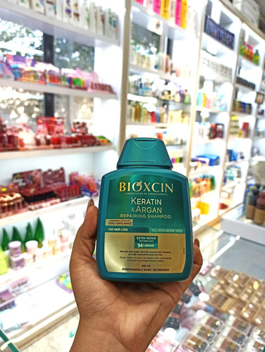 شامپو ضد ریزش و ترمیم کننده آرگان و کراتین BIOXCIN حجم ۳۰۰ میل